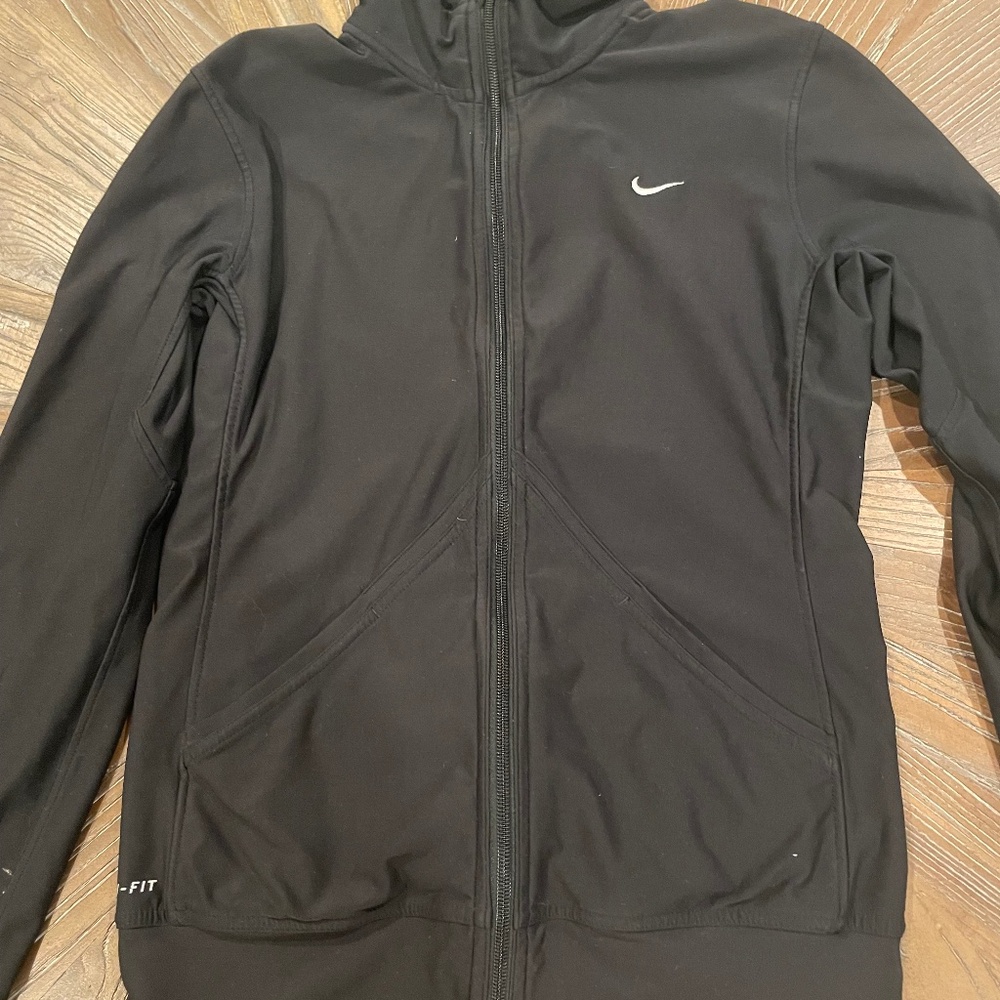 Nike dri fit zip up women's small in color black
